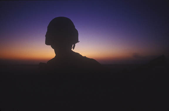 Saudi Arabia:
Desert dawn watch for 1st cavalry soldier.