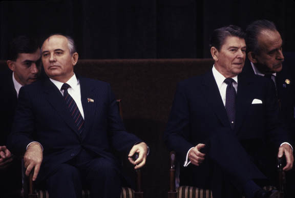Geneva, Switzerland:
Pres. Reagan and Pres. Mikail Gorbachav with interperters at the conclusion of their first summit.