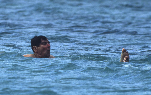 Honolulu, Hawaii:
Pres. Reagan takes a swim on a stop over enroute China.