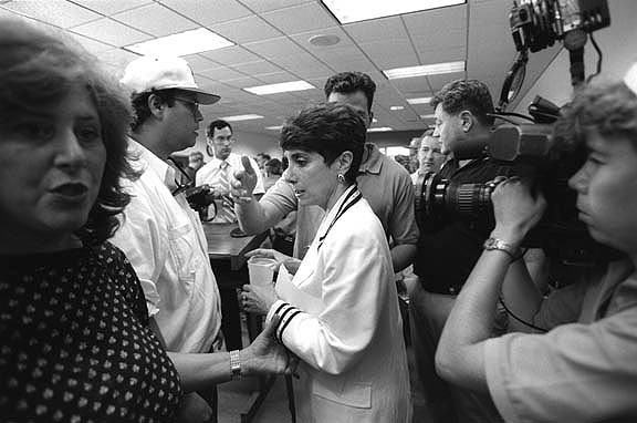 THE CRUCIAL BUDGET VOTE:
Congresswoman Mezvinsky is is confronted
by voters and media upon her first visit back
to her district after her budget vote.