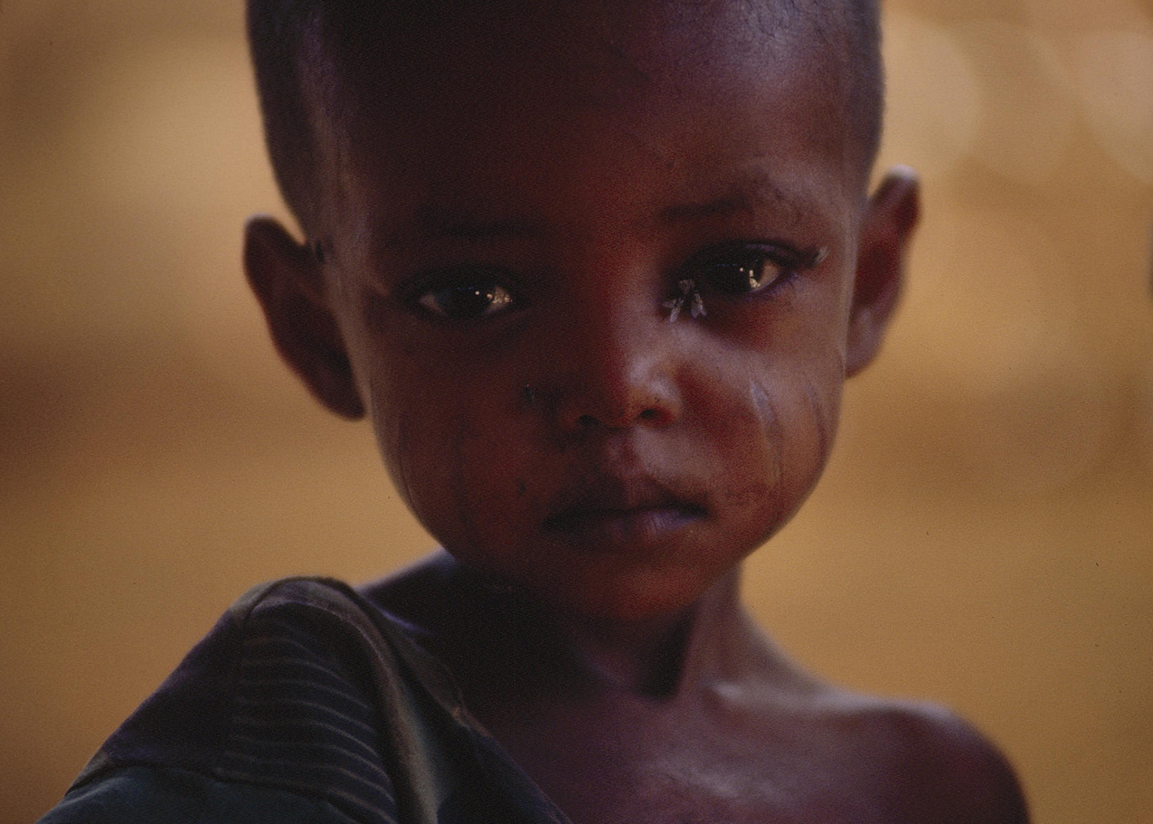 Eastern Sudan:
Child at Wad Sharife Refugee Camp.